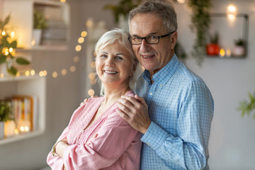 Poster - Portrait of a happy senior couple at home 