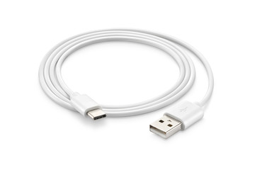 A white USB type C charger cable, compatible for many devices, wrapped in a spiral shape, isolated on white background.