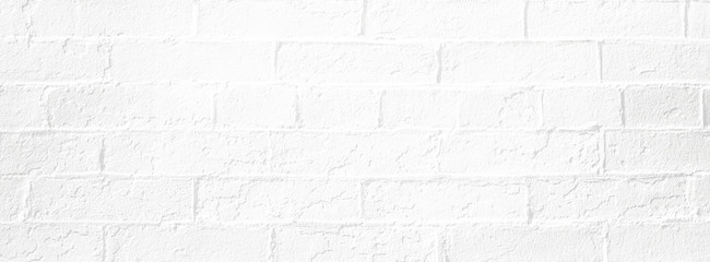 Wall Mural - White brick wall background. Neutral texture of a flat brick wall close-up.