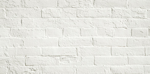 Wall Mural - White brick wall background. Neutral texture of a flat brick wall close-up.