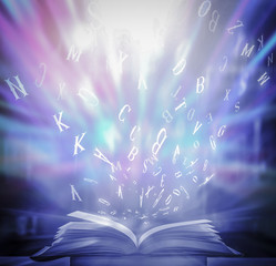 Poster - Imagine opening an old book blurred with magic power on the table and the English alphabet floating above the book with magic light as a beautiful background design.