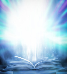 Poster - The blurred book that is bewitched with magic, the magic light in the dark, with the bright light shining down as the power to search for knowledge. For research and use as a blurred background