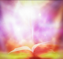 Poster - The blurred book that is bewitched with magic, the magic light in the dark, with the bright light shining down as the power to search for knowledge. For research and use as a blurred background