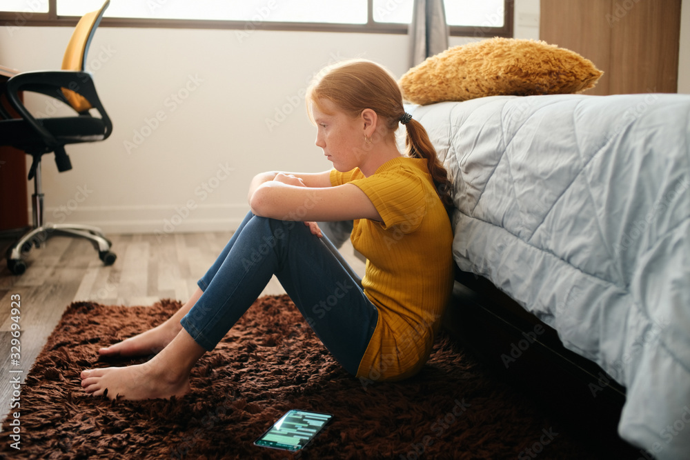 Preteen Bullied Girl Feeling Lonely And Sad At Home - obrazy, fototapety, plakaty 