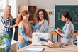 © Pixel-Shot - Young women during tailor's class in atelier