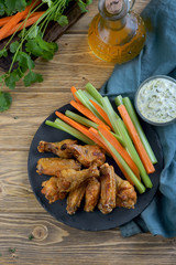 Wall Mural - fried chicken wings with vegetables