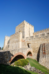 Historical Sao Jorge Castle (Saint George Castle, Castelo de Sao Jorge) in Lisbon, Portugal, on a sunny day in the summer.