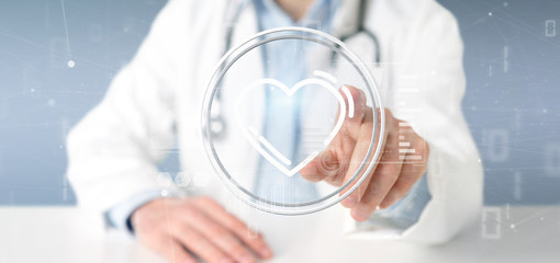 Wall Mural - Doctor pointing using a stethoscope at the clinic