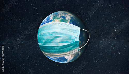 The planet earth is wearing a protective mask in the space. Concept of quarantine, protection from viruses and pandemic. Elements of this image furnished by NASA