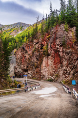 Wall Mural - Altai Republic, Russia - September, 18, 2019: Red Gate Rock, a tourist and natural attraction