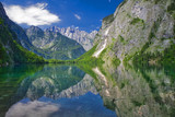 Fototapeta Góry - lake Obersee with reflections and view to the alps mountains with ducks