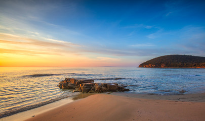 Wall Mural - Sunset in Cala Violina bay beach in Maremma, Tuscany. Mediterranean sea. Italy.