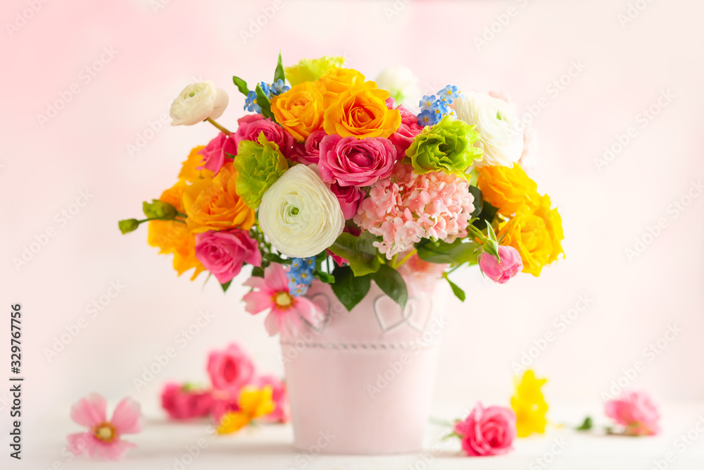  Beautiful spring flowers in vase on white wooden table. Festive concept with copy space. - obrazy, fototapety, plakaty 