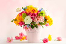  Beautiful Spring Flowers In Vase On White Wooden Table. Festive Concept With Copy Space.