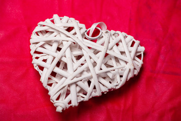Poster - white wooden heart on a colored background. grunge texture