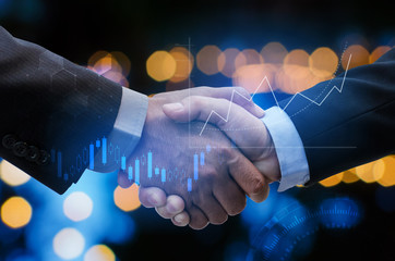 Wall Mural - business man shaking hand with global network link and graph chart stock market graphic diagram and bokeh light background, digital technology, internet connection, teamwork and partnership concept