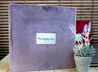 Wall Mural -  album and photo book velor material for sale, violet colors, close-up