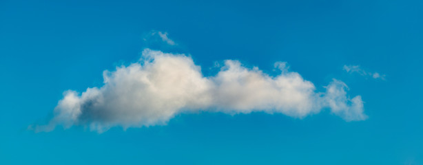 Fantastic clouds against blue sky, panorama