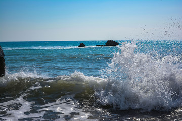 waves breaking on the rocks