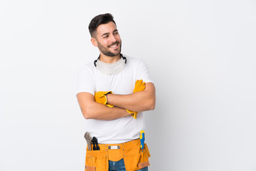 Canvas Print - Craftsmen or electrician man over isolated white background laughing