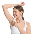© New Africa - Young beautiful woman showing armpit with smooth clean skin on white background