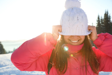 Poster - Young woman having fun outdoors on snowy winter day