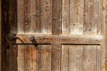 Canvas Print -  Wood structure on an old door