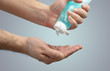 Person applying hand sanitiser gel to kill bacteria and disease - Close up of hands washing  and cleansing with hygienic soap sanitizer - Hygiene and cleaning, Antibacterial and Coronavirus concept