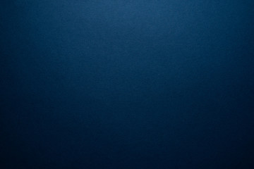 empty dark blue background. dark blank with a slight glow.