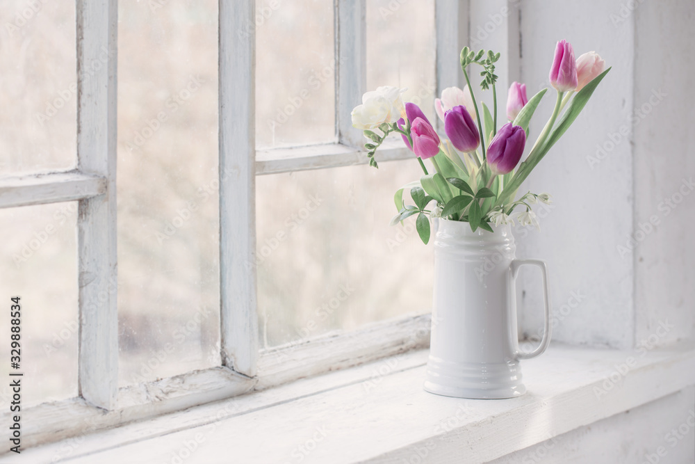 beautiful tulips on old white windowsill - obrazy, fototapety, plakaty 