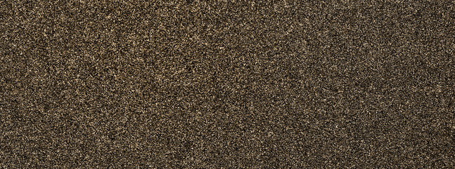 Granular abstract uniform grainy surface. Rough texture background.