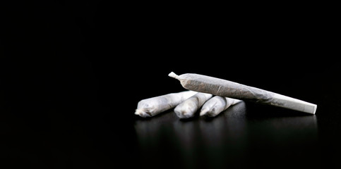 Marijuana Joint on Black Background, Cannabis, Weed Joint