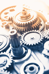 Poster - gears industrial background with warm shiny light