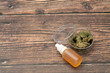 © Jair Fonseca - Marijuana cannabis Medicinal, weed joint In a glass container. Medical extract of cannabis marijuana oil in jar