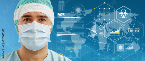 Fotomural medicine and pandemic concept - surgeon in protective mask over virtual projecti