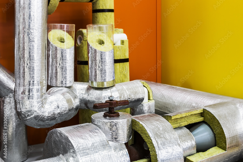 mineral wool cylinders for insulation of pipelines for cooling ventilation and air conditioning systems - obrazy, fototapety, plakaty 