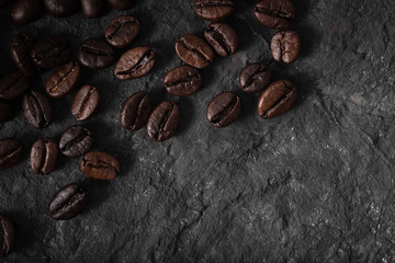 coffee beans background,Coffee beans close up,Closeup of coffee beans at roasted coffee heap.