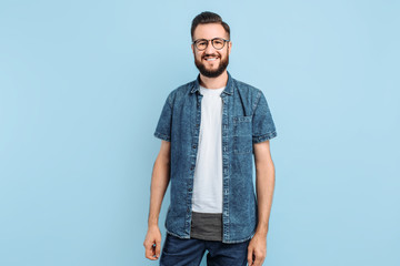 Wall Mural - Young man with glasses