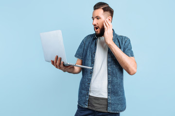 Wall Mural - Happy smart person with a laptop