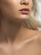 © evgeniyasht19 - Sexual full lips. Natural gloss of lips and woman's skin. The mouth is closed. Increase in lips, cosmetology. Pink lips and long neck. Gentle pure skin and wavy blonde hair.