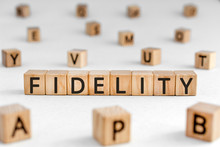 Fidelity - Word From Wooden Blocks With Letters, Loyalty Allegiance Fidelity Concept, Random Letters Around White Background