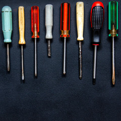 Screwdrivers of different shapes, sizes and colors for repair and business