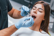 © standret - Young adult woman have a visit in the dentist clinic. Conception of stomatology