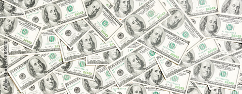 Cuadros en Lienzo Top view of one hundred dollar banknotes made as a background