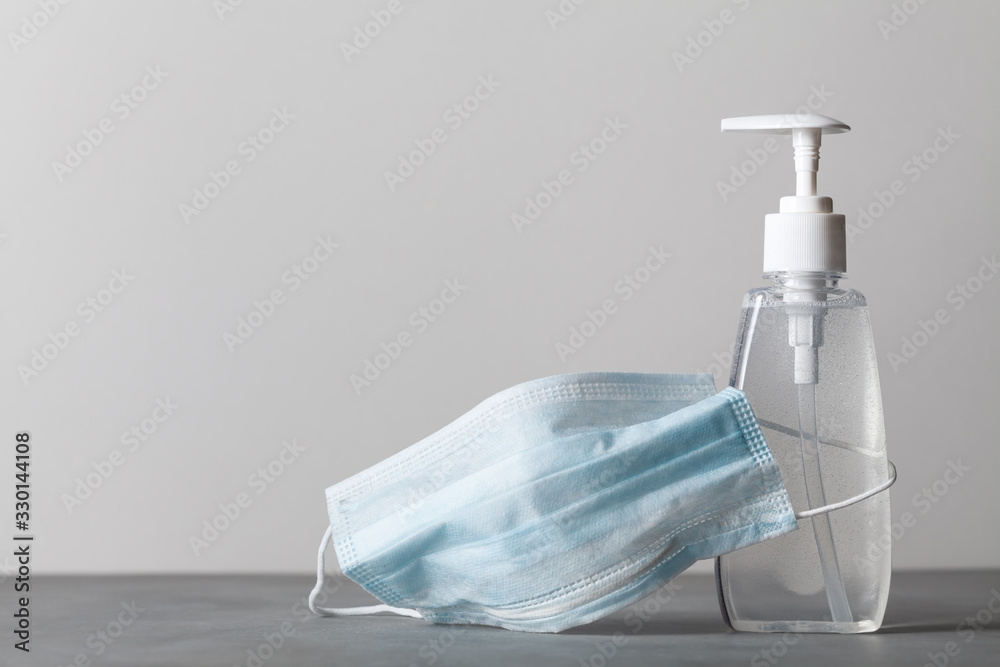 Sanitizer gel or antibacterial soap and face mask for coronavirus preventive measure - obrazy, fototapety, plakaty 