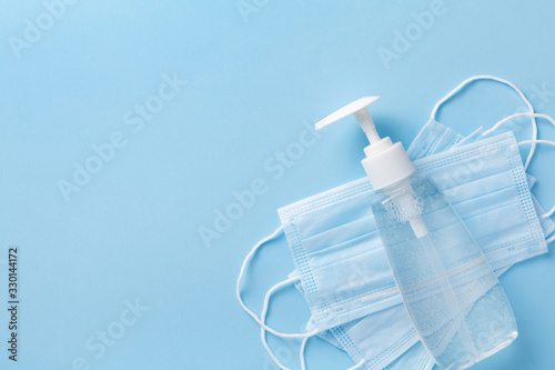 Fotomural Sanitizer gel or antibacterial soap and face mask for coronavirus preventive mea