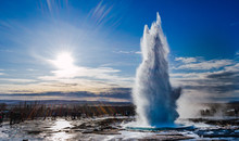 Geyser In Sunny Winter Day In Iceland.