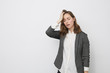 © Martin Villadsen - Businesswoman having her hand on her head while looking dejected