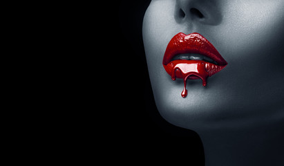 Poster - Red Lipstick dripping. Paint drips, lipgloss dripping from sexy lips, Blood liquid drops on beautiful model girl's mouth, creative abstract make-up. Beauty woman face makeup close up, vampire