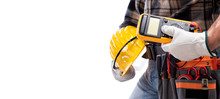 Electrician Holds Multimeter Tester In Hand, Helmet With Protective Goggles. Construction Industry, Electrical System. Isolated On A White Background.
